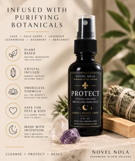 A bottle of Novel Nola Protect Crystal-Infused Smokeless Aurum Mist shown on a warm beige promotional background with text callouts, crystals, and natural props. The product itself is a black spray bottle with a clear cap and white label text.